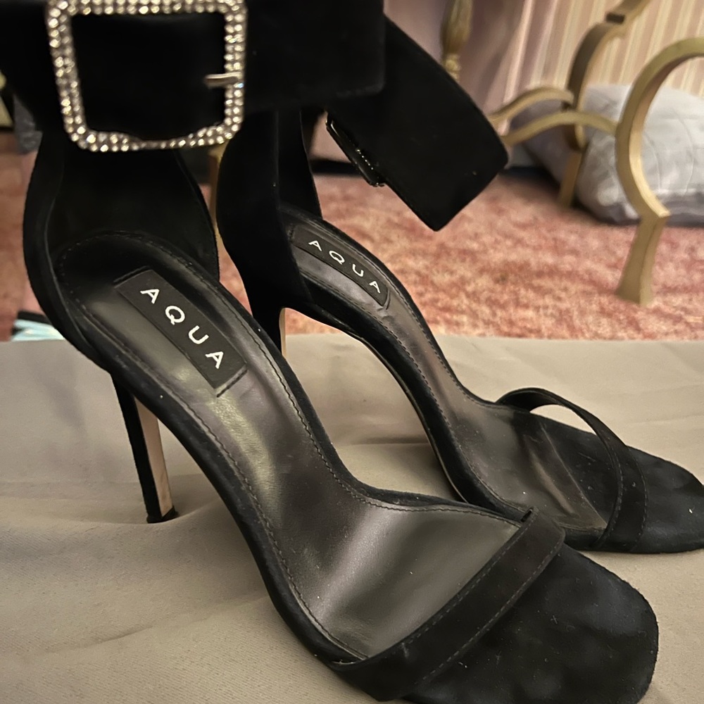 Beautiful black stilettos with Rhinestone buckles around ankles .. worn once
